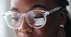Reflection, employee and woman with glasses, vision and research for data analysis, sales and company. Business, eyecare and review of graphs on website, prescription and black person with eyewear