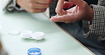 Optometry, contact lens and hands of woman with liquid for eye care, health and wellness. Healthcare, medical and person with solution in container for protection for vision, eyesight or prescription