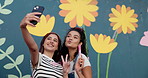 Wall art, women and painting mural with selfie for creative, community project and student hobby. Friends, peace sign and phone for flowers artist, diy decor and painter post with expression outdoors