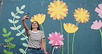 Painter, selfie and woman with smile, creative and photography of wall art for memory and confident. Mural, artist and person with picture for social media, influencer and proud of finished artwork