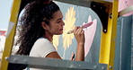 Ladder, woman and painting on wall for creative flower, decoration design or volunteer. Artist, happy painter and outdoor with brush for environment activist, wind or sustainable art on mural in city
