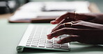 Person, hands and typing on keyboard in office for email, spreadsheet and proposal or application for work. Woman, online and technology with task for drafting, digital notes and business report