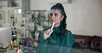 Business woman, writing or thinking with glass board for mindmap, planning or brainstorming at office. Female person, employee or planner with notes, graph or chart for project ideas at workplace