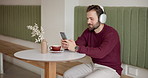 Man, mobile or relax in cafe with music, social media or smile for updated streaming subscription. Happy customer, coffee or phone in restaurant with audio app, connectivity or headphones for privacy