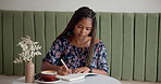Writing, relax and woman in cafe, notebook and thinking with inspiration, calendar and diary. African person, customer and writer in coffee shop, espresso and cappuccino with ideas and creativity
