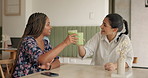 Women, happy and matcha in cafe with cheers, drinking or smile for health benefits with detox. Friends, reunion and glass with iced beverage for refreshment, bonding or weekend meet up in coffee shop