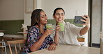 Happy woman, friends and selfie with drink at cafe for social media, photography or picture at restaurant. Female people, influencer or memory with smile, green beverage or smoothie at coffee shop