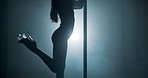 Woman, stage and pole dancer in silhouette for dance, exotic performance or seduction in spotlight. White neon, aesthetic and performer in shadow for burlesque, bright light or space in private venue