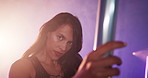 Dancer, sexy and face of woman in studio for burlesque, stage choreography and performance. Neon light, pole dancing practice and exotic performer with person for artist, fitness and confidence