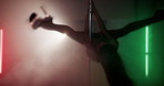 Stage, lights and pole dance with woman in smoke for sensual art, performance and movement. Body, sexy and burlesque dancer with night, confidence and neon lingerie show at entertainment club 
