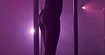 Woman, pole dancing and neon in club with exotic performance, purple lights and burlesque. Dancer, movement and striptease with sexy choreography, lingerie show and private entertainment of nightlife