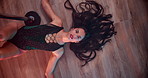 Pole, dancer and woman on floor with music, burlesque and performance above in nightclub. Erotic, girl dancing and artist moving for sensual art, sexy and face with exotic body in lingerie on stage