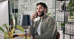 Man, phone call and computer in office with discussion for project management at web design company. Person, smartphone and smile with agreement, review and feedback negotiation at creative agency
