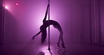 Pole dance, dancer and silhouette of woman in club for performance, talent and choreography. Creativity, artist and person with neon, lights and sensual for confidence, burlesque and entertainment