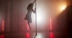 Performance, flexible and exotic dancer with pole, fitness and entertainment at nightclub or balance. Dancing, artist and woman with equipment for routine, active and performer with talent for show