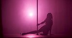 Dancer, sexy and neon with silhouette of woman in studio for burlesque, stage choreography and performance. light, pole dancing practice and sensual with person for artist, fitness and confidence