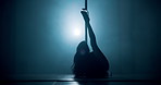 Pole dancing, dark and silhouette of woman in club for performance, talent and choreography. Creativity, artist and person with neon, lights and sensual dancer for confidence, burlesque and routine