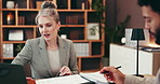 Collaboration, meeting and writing with business people in office together for discussion or negotiation. Consulting, conversation or review with manager and employee in workplace for feedback
