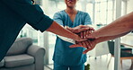 Nurse, team and hands together with celebration in hospital for medical success, health support and good news. Healthcare group, people and stack gesture in boardroom for clinic excellence and goals