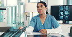 Surgeon, woman and meeting with monitor for neuroscience, discussion and problem solving at hospital. Person, doctor and explain with mri results, review and talk with brain scan for medical research