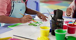 Hands, student and painting art in classroom with creative lesson, drawing picture and kindergarten learning. Kids, artist and sketch with fun activity, artwork project and motor growth for education