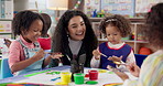 Painting, teacher and children with smile, art and creativity in classroom, growth and development. Talk, woman and teaching kids in preschool, learning and education for youth with color for artwork