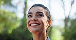 Thinking, happy and woman with hiking in forest for travel adventure, sightseeing nature or fitness. Trekking, face and breathe in woods for fresh air, weekend break or peaceful reflection on journey