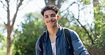 Happy, nature and portrait of man hiking in forest for activity, hobby or exercise outdoor. Backpacjing, fitness and face of male person in woods for trekking with cardio workout in morning.