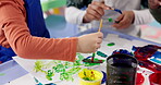 Hands, kids and painting art in classroom for creative lesson, colorful drawing and kindergarten learning. Artist, student and picture with fun activity, artwork project and motor growth of education
