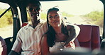Couple, road trip and safari with drive, tourism or holiday with bonding, love and hug at national park. People, man and woman with smile with embrace, vacation or memory in vehicle at game reserve