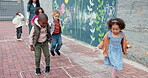 School, children and playing hopscotch outdoor with teacher for recess, learning break and fun activity. Montessori, people and playground game for gross motor skills, balance and agility development