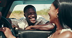 Travel, road trip and happy couple in conversation by car window for holiday destination, vacation or journey. Love, man and woman talking in vehicle for transport, laugh and interracial relationship