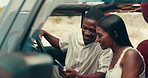 Phone, happy and couple in car for route, navigation or map to holiday home for vacation together. Love, romantic and man with woman on cellphone for online hotel checkin in vehicle for road trip.