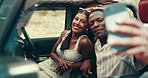 Couple, road trip and happy for selfie in car, gesture and post on web with journey, holiday and love. People, man and woman with photography, memory and profile picture with social media in vehicle