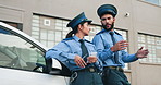 Police, officer and people on road in city talking for traffic rules, safety and vehicle protection. Law enforcement, security and man and woman chat on break for patrol, surveillance and guard
