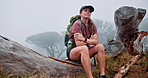 Mountain, hike and woman with fitness, cold and travelling with jacket, journey and environment. Person, outdoor and hiker with weekend break, lost and wellness with fitness, fog and healthy girl