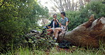 Hiking, friends and women in nature with drink for bonding, relax and conversation outdoors on weekend. Travel, happy and people relax in forest for adventure, journey and exercise on mountain