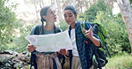 Hiking, happy and women with map in nature for direction, navigation and location in forest. Mountain, friends and people with paper for guide on adventure, journey and travel outdoors for health