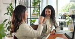 Fist bump, business women and celebration for success in office, goal and milestone on computer. Excited workers, hand gesture and achievement with secret handshake for promotion, winning or teamwork