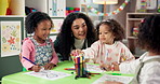Woman, teacher and kids with drawing in kindergarten classroom for early childhood development. Female person, educator or instructor helping children for youth, fun activity or coloring at school