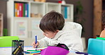 Child, school and boy drawing for art, learning and development in kindergarten classroom. Kids, writing and motor skills for growth, education progress and creative student with color at academy