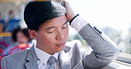 Business, commute and stress with Asian man on bus for public transportation to job destination. Anxiety, thinking and travel with corporate employee at window in vehicle for city journey to work