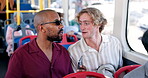 Travel, friends and men with smartphone, bus and fist bump for journey in public transport and smile. Commuting, bonding and people with mobile for directions, laughing and happy for trip in vehicle