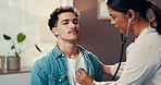 Healthcare, man and doctor in office, checkup and help with stethoscope, wellness and talking. People, medical exam and professional in hospital, conversation and patient with consultation for heart