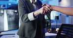 Handshake, security and monitor for surveillance at office with agreement, deal or welcome to company. People, safety professional and shaking hands for thanks, respect or achievement at data center