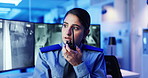 Surveillance, security guard and woman with radio, talking and inspection of crime on screen and night. Control room, law enforcement and person with tech for communication, footage and protection