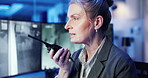 Night, woman or radio in control room for protection, security service or communication for report. Late, mature guard or tech in office for surveillance, contact and building safety update with CCTV