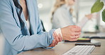 Business woman, keyboard and wrist pain with stress for deadline, pressure or muscle tension at office. Frustrated person, consultant or employee with injury, sore ache or inflammation with fatigue