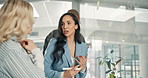 Business, discussion and people writing on glass wall for story development, publication layout or creative project. Newsroom, editor and meeting for headline ideas, article planning or brainstorming