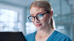 Healthcare, tablet and telehealth with nurse in hospital for review of information or records. Glasses, insurance and medical with professional woman in clinic for diagnosis, feedback or results